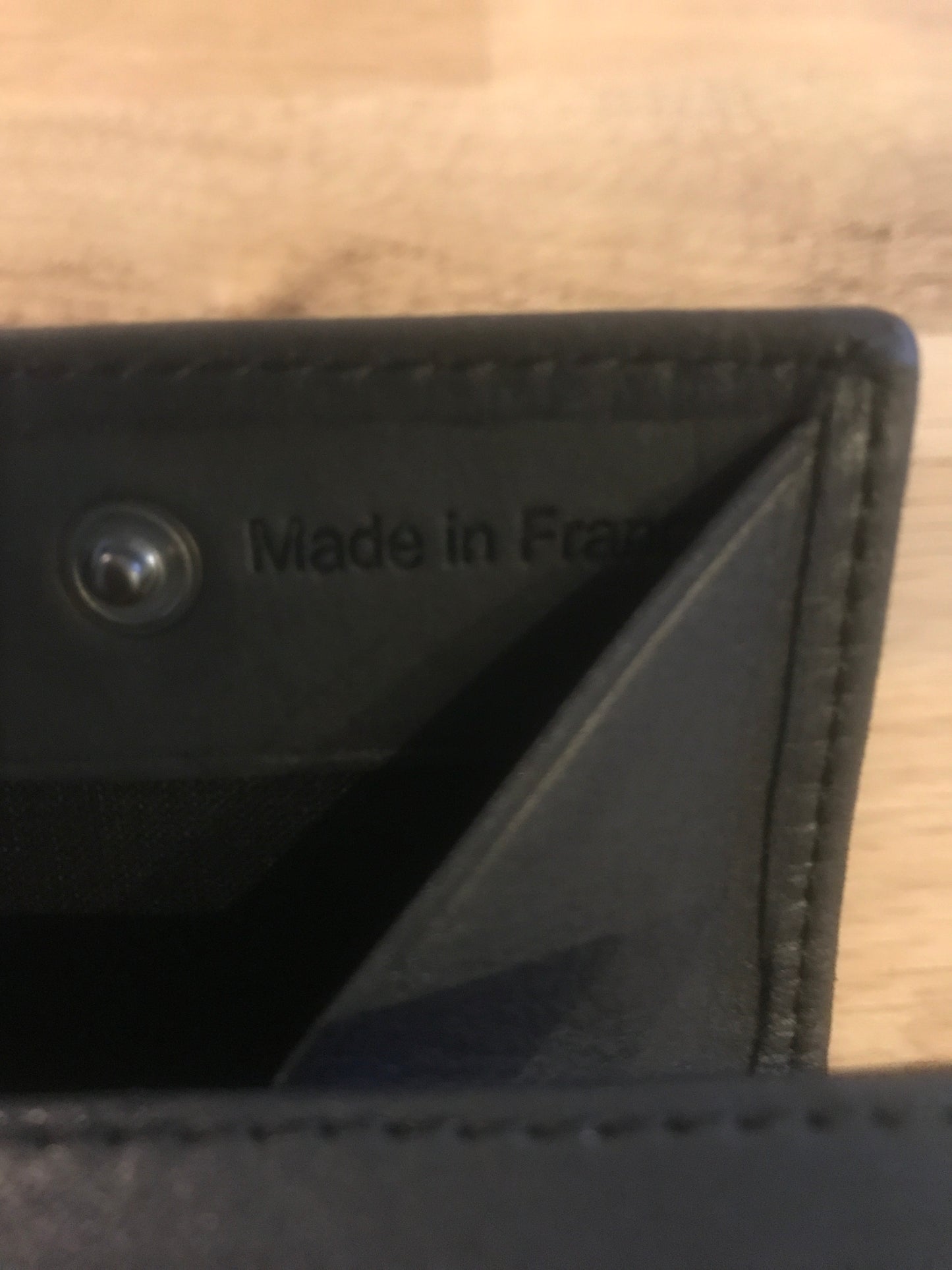 Petit porte-monnaie en cuir noir ligne Oil - Etrier