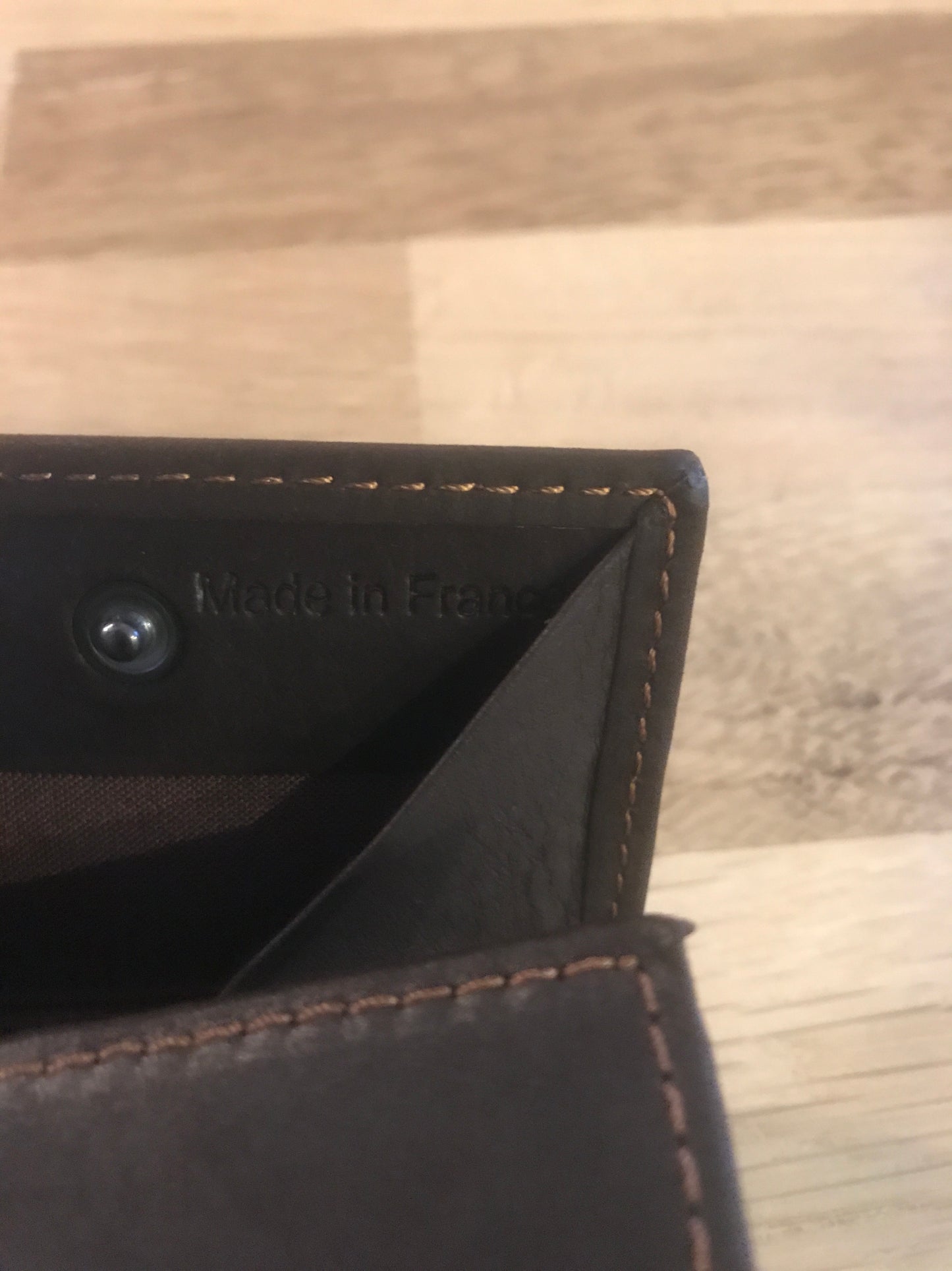 Petit porte-monnaie en cuir marron foncé ligne Oil - Étrier