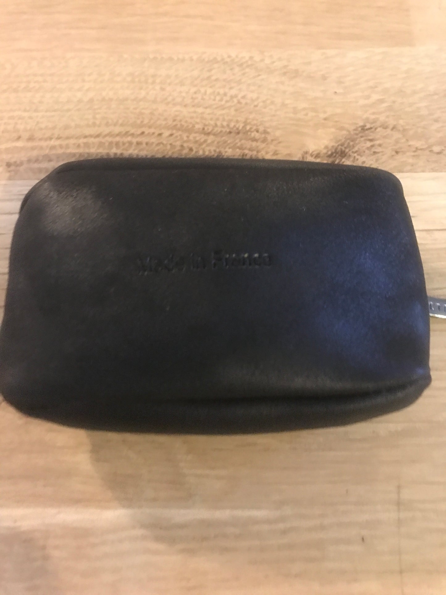 Porte-monnaie en cuir noir ligne Oil / Etrier