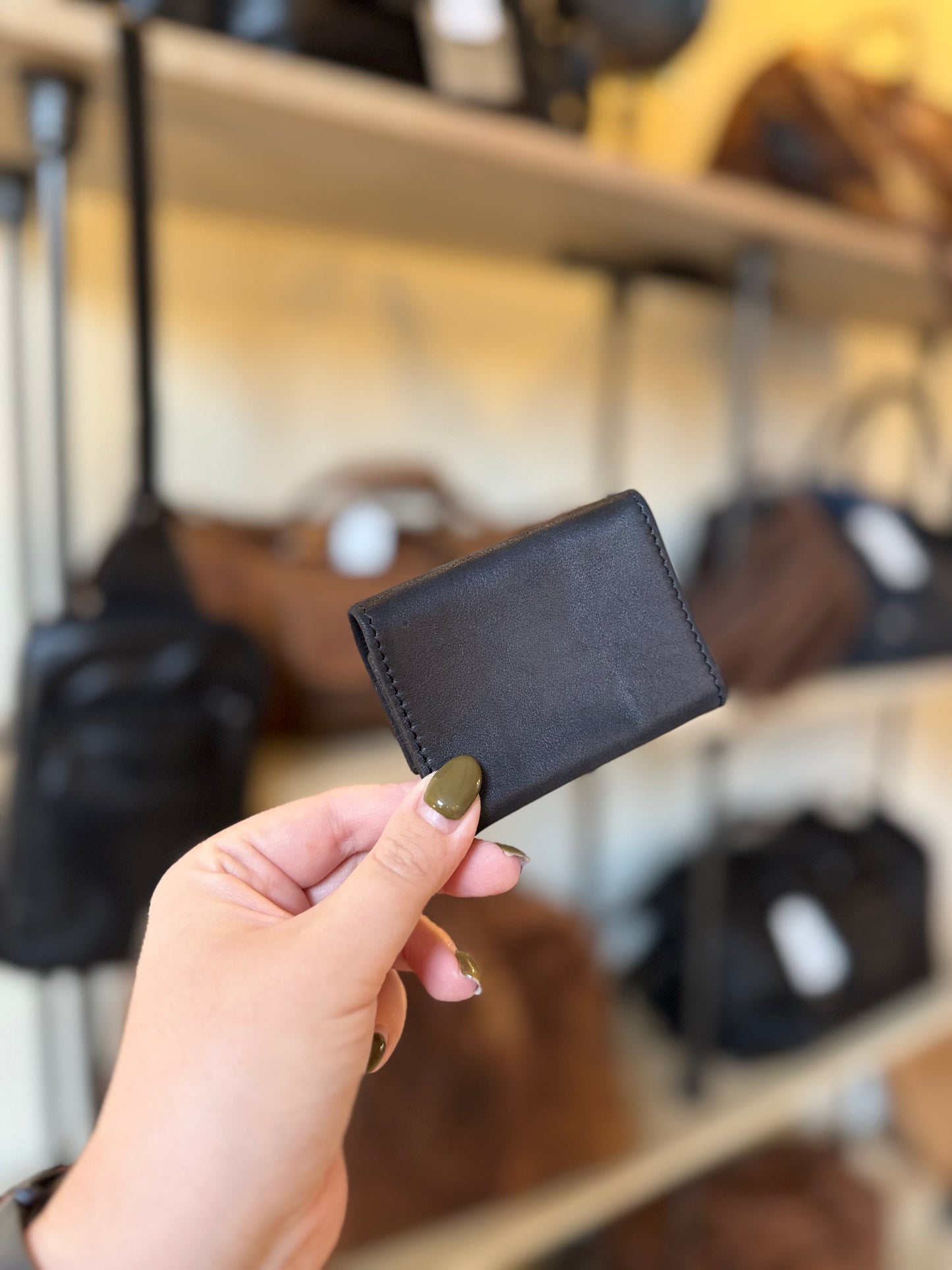 Petit porte-monnaie en cuir noir ligne Oil - Etrier