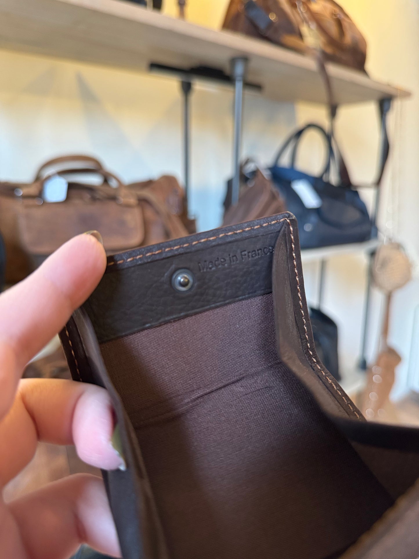 Petit porte-monnaie en cuir marron foncé ligne Oil - Étrier